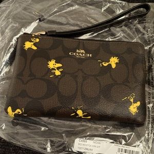 Coach wristlet- Peanuts - Woodstock